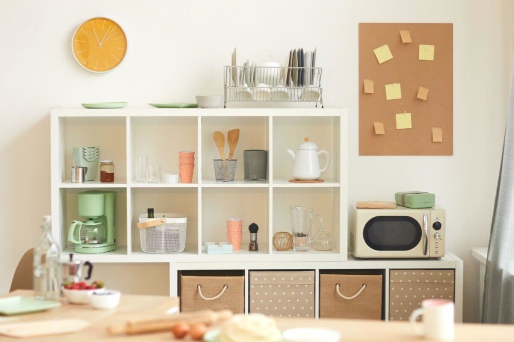 Bring in a bookshelf to create a makeshift pantry space.